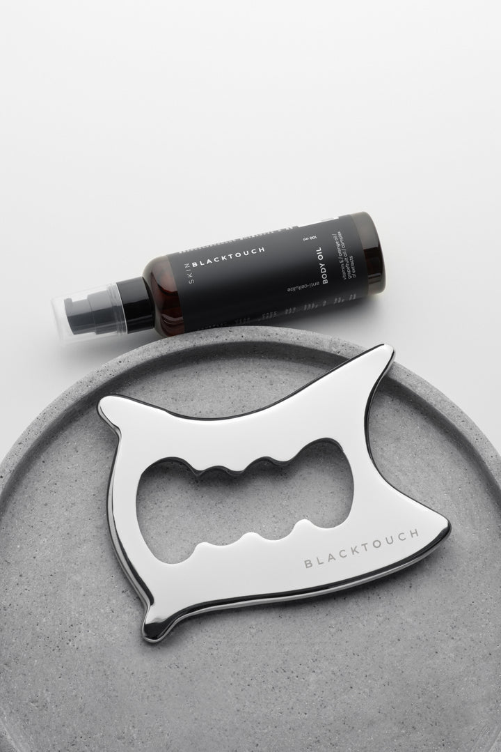 КОМПЛЕКТ "Steel Gua Sha & Anti-Cellulite Oil" - BLACKTOUCHUKRAINE